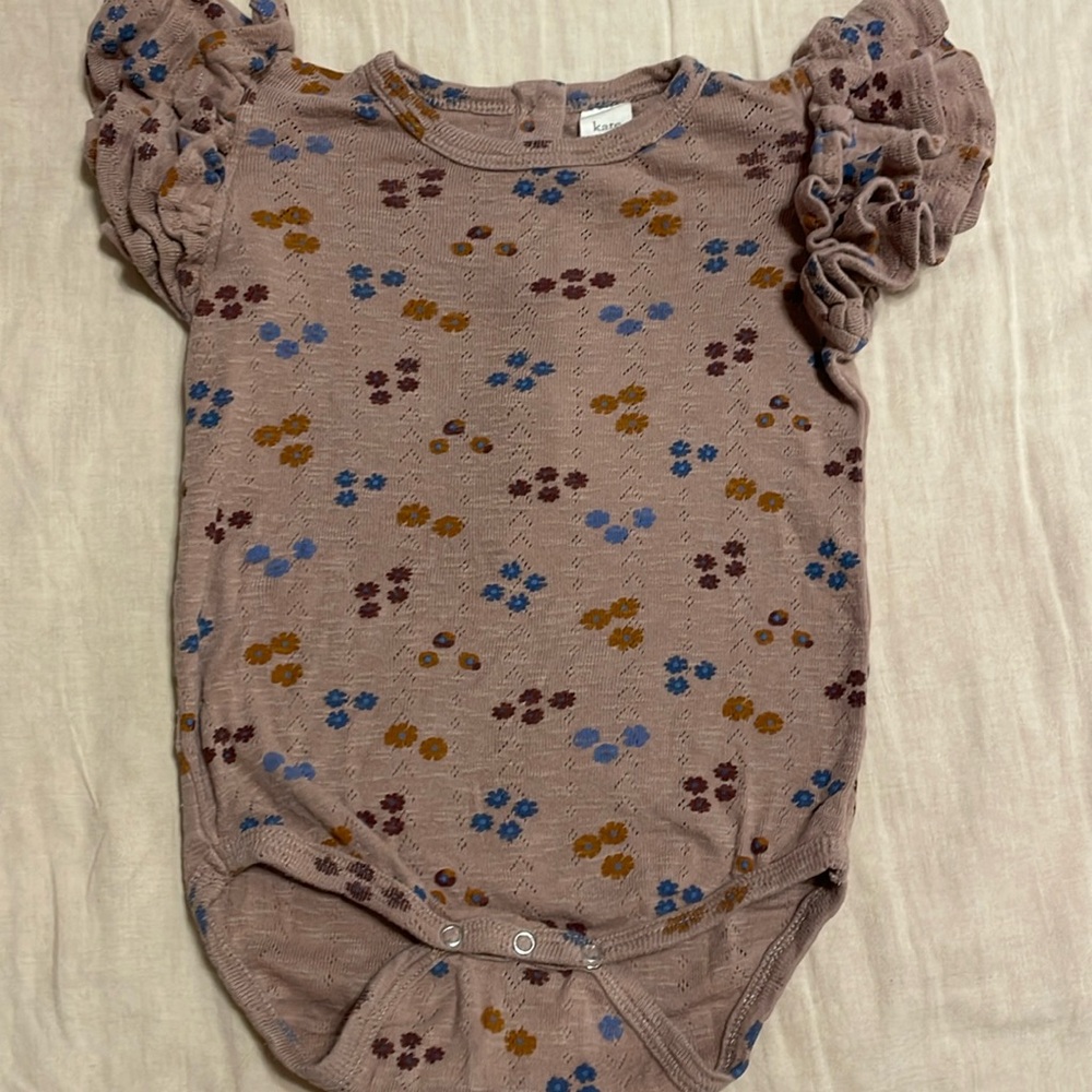 Kate Quinn pointelle ruffle shoulder onesie